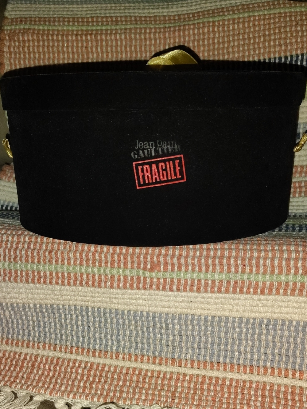 Jean Paul Gaultier Black Hat Box with Red 'FRAGILE' Stamp and Gold Accents
